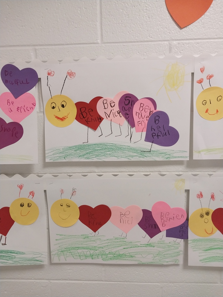 Kindness caterpillar kindergarten artwork is in this image. Messages of"be kind" "be a friend" "be nice"