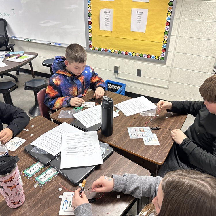 Mr. Berger has a very "bright" class doing an activity on electricity in class.