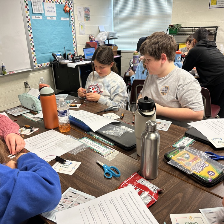 Mr. Berger has a very "bright" class doing an activity on electricity in class.