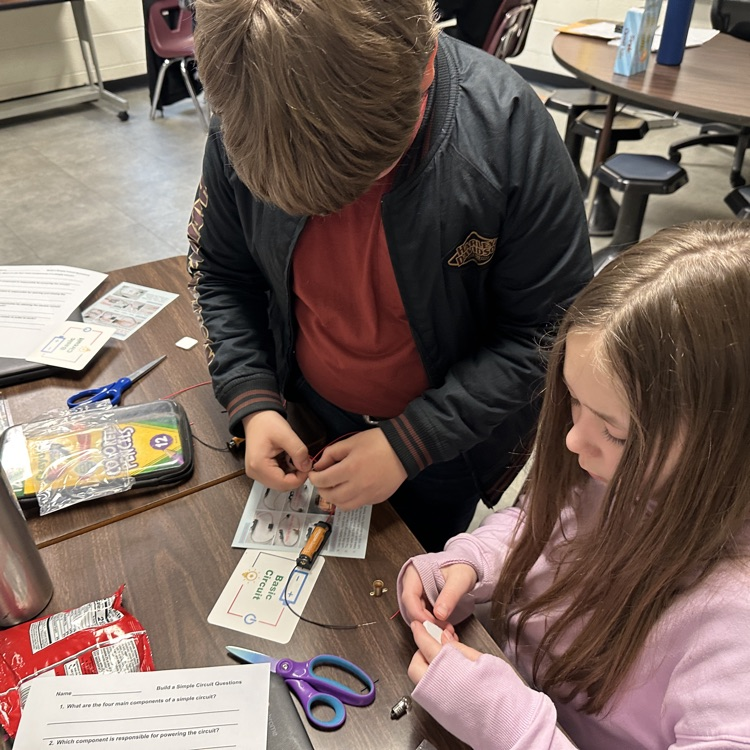 Mr. Berger has a very "bright" class doing an activity on electricity in class.
