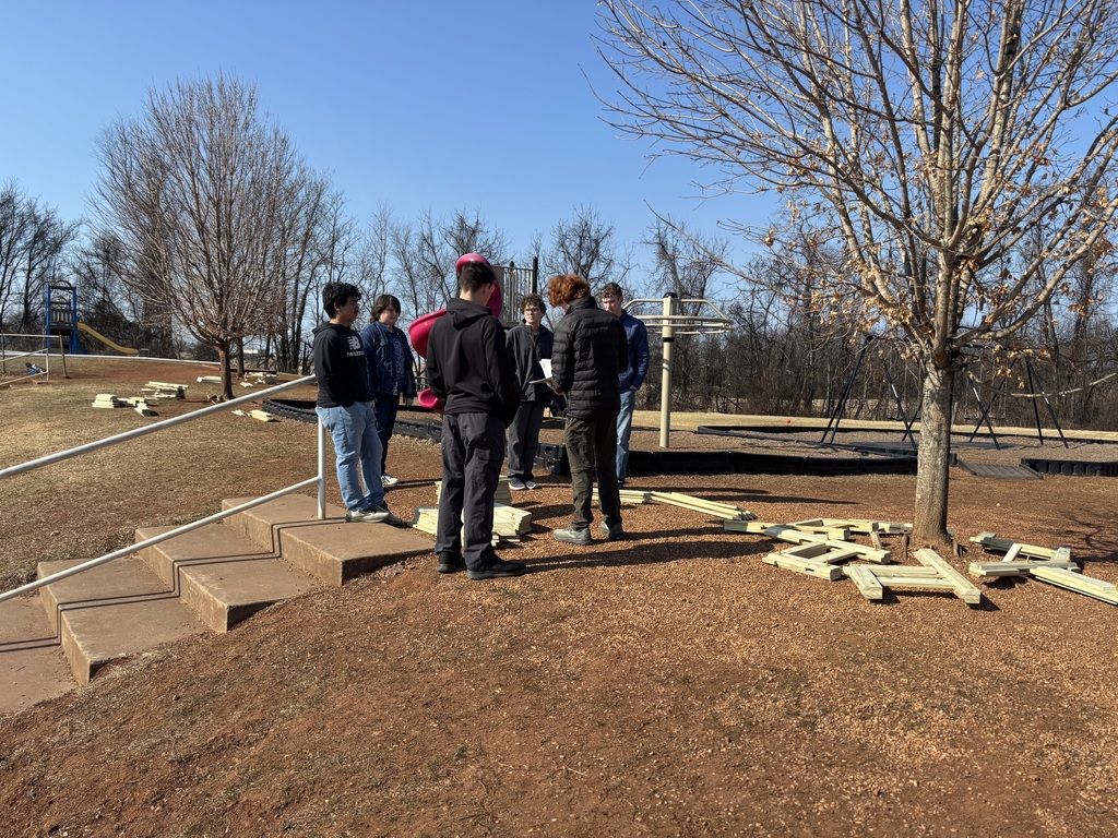 Today, AGR Alumni Ben Tomblin (son of AGR staff's Mrs. Tomblin), as part of his Eagle Scout project and with much help from his troop, built three circular benches on the Grade 2nd-5th playground. These were needed for students and staff, and will certainly get lots of use.  Thanks so much Ben and his Boy Scout troop!