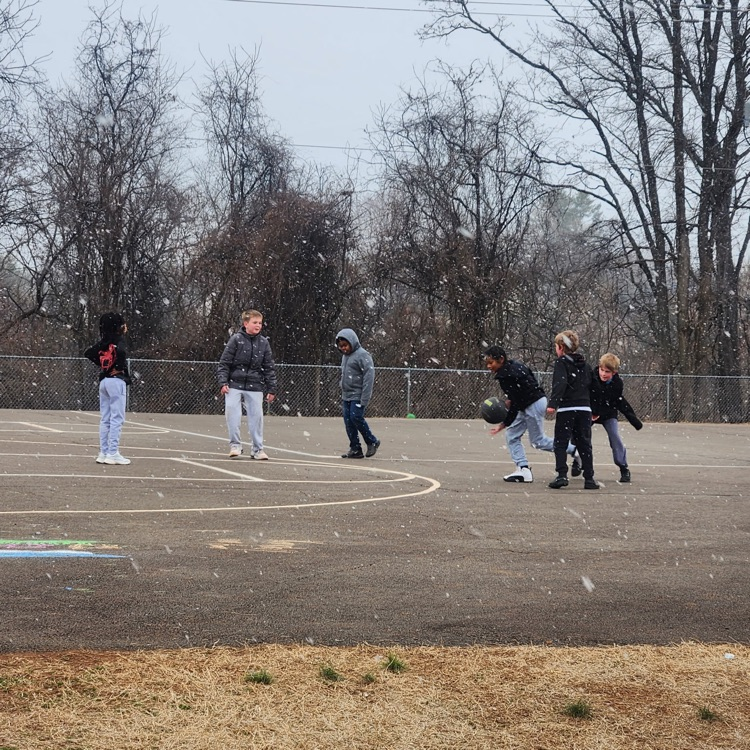 A first, and last, for many 5th graders, recess in the snow!  Here they are actively playing among the flakes!