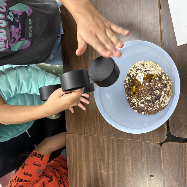 4th graders pictured here following directions to make recipes