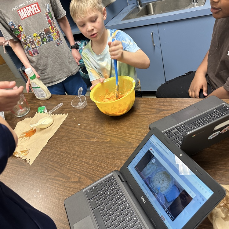 4th graders pictured here following directions to make recipes