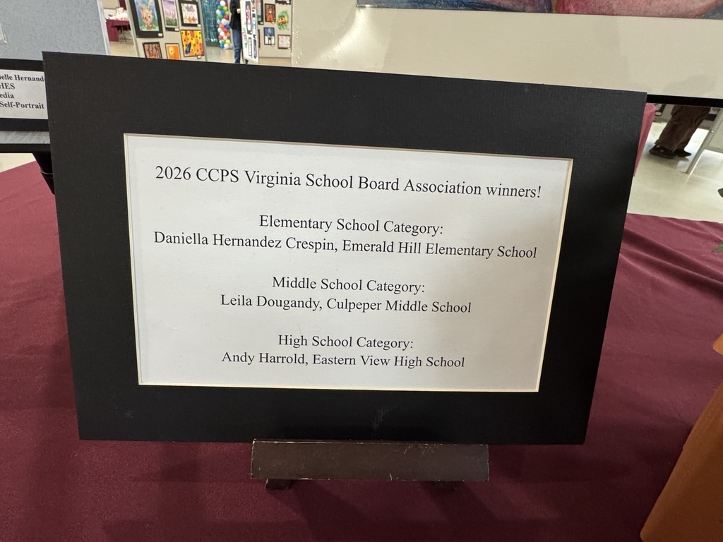 Sign on a table that says 2026 CCPS Virginia School BOard Association winners.  Elementary School Daniella Hernandez Crispin Emerald Hill Elementary, Middle School Leila Dougandy Culpeper MIddle School; HIgh School Andy Harrold Eastern View High School 