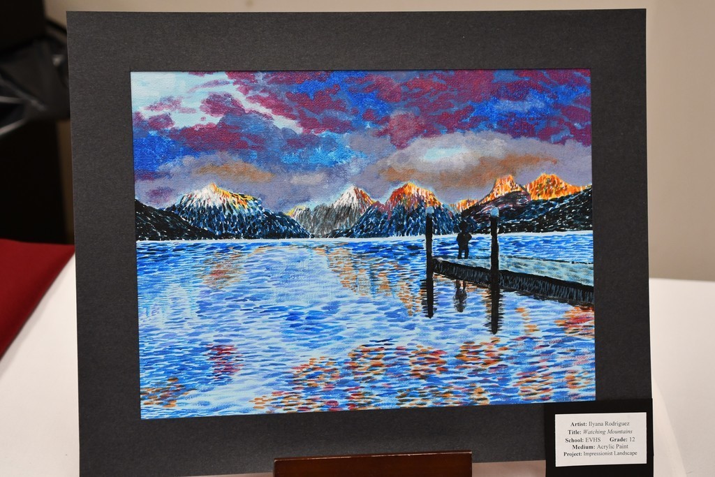 artwork showing  lake with a dock and mountains in the background