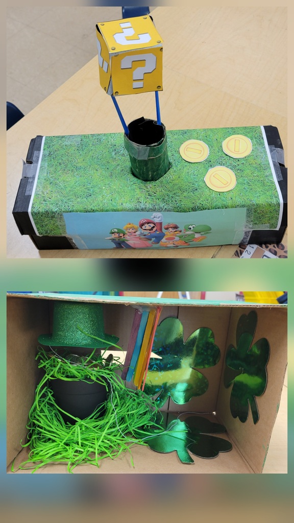 A Mario-themed trap features a yellow question block above a pipe with paper coins nearby and characters printed along the side.