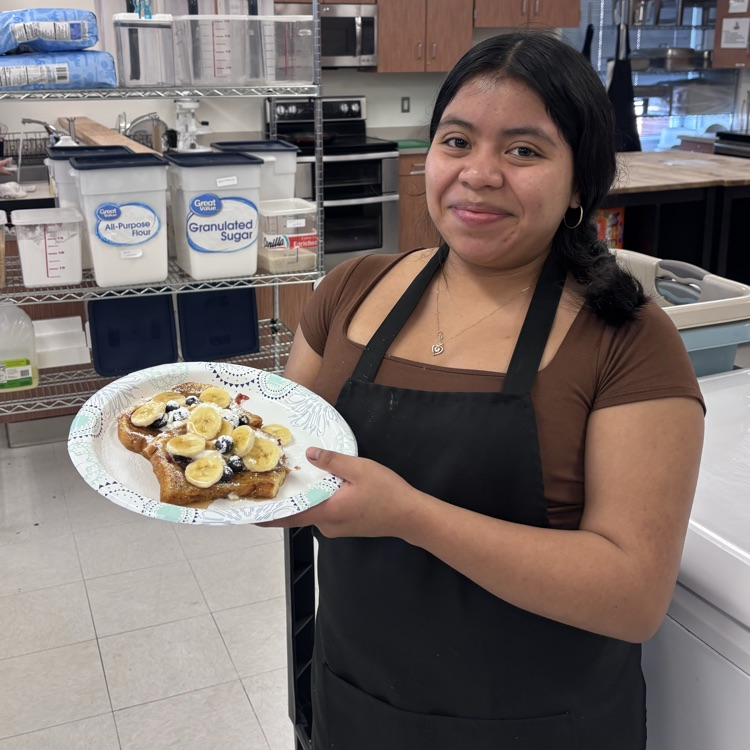 Mrs. Frazier’s Nutrition and Wellness class worked in teams in the lab using their cutting, cooking, and teamwork skills to make French toast with fruit and fresh whipped cream.