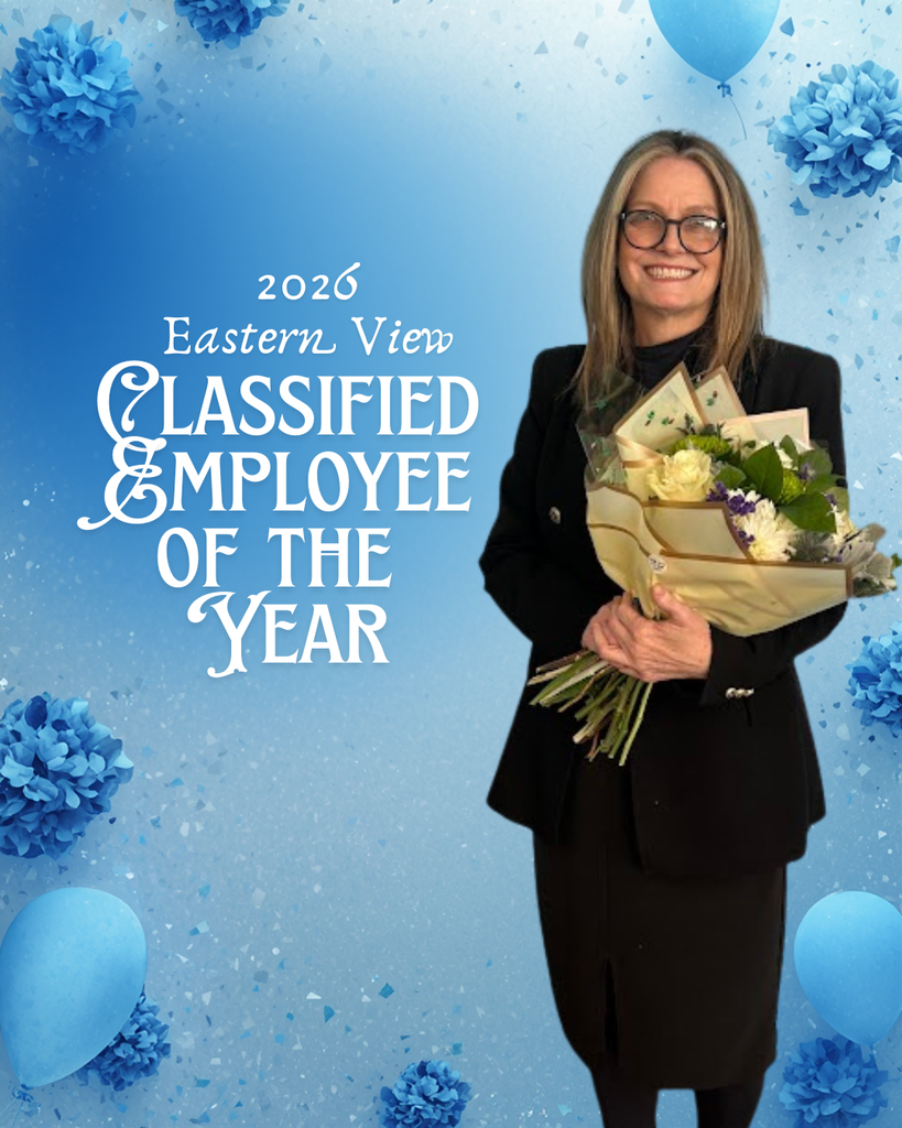 The image shows a celebratory award graphic with a soft blue background decorated with confetti-like shapes, balloons, and flower-like accents.  On the right side stands a smiling woman, likely middle-aged, with straight, shoulder-length light brown hair. She is wearing glasses and a black outfit (a blazer over a dress or top). She is holding a bouquet of flowers wrapped in tan paper—cream-colored roses and small purple flowers are visible. Her posture is upright and relaxed, and she appears happy and proud.  On the left side of the image, large white decorative text reads: “2026 Eastern View Classified Employee of the Year”  The overall tone is festive and formal, suggesting recognition and appreciation for her achievement.