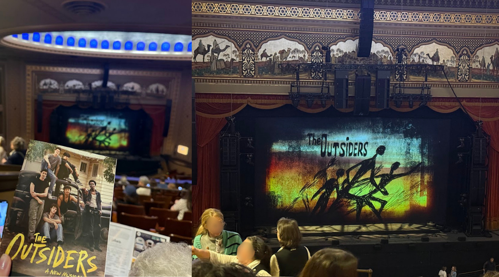 Interior of the Altria Theater with students seated and looking toward the stage, where “The Outsiders” set and title are displayed before the performance.