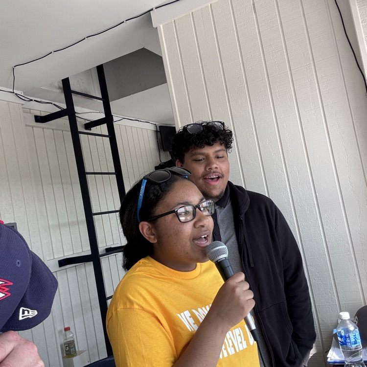 Lakeisha Gray and Tim Winchell singing the National Anthem