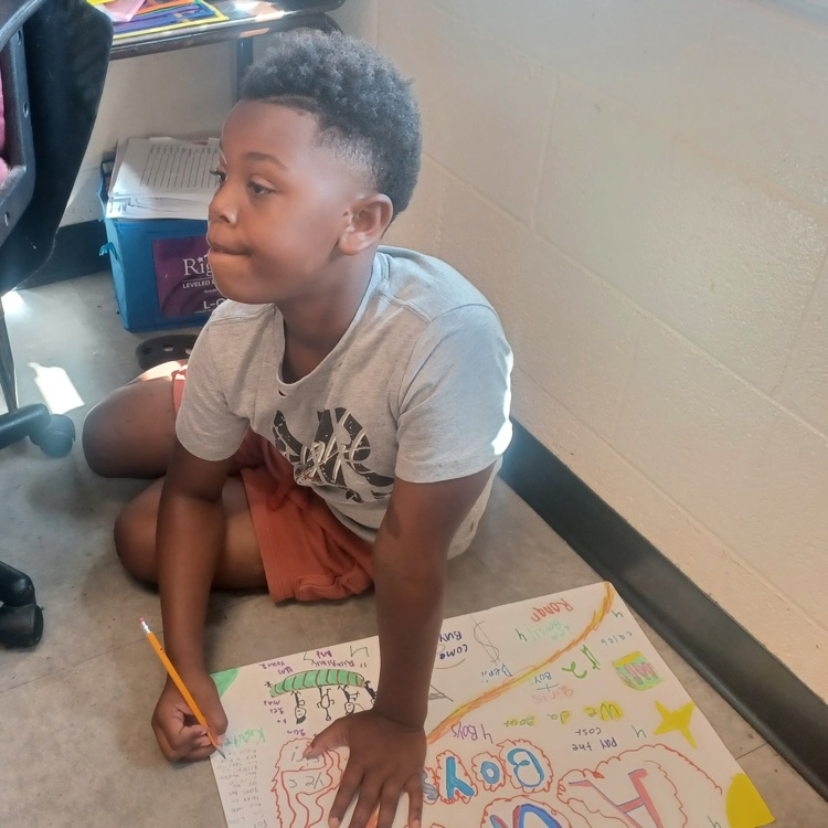 Ms.C's 3rd graders are working hard preparing for Market Day. They are very creative and great team workers too.