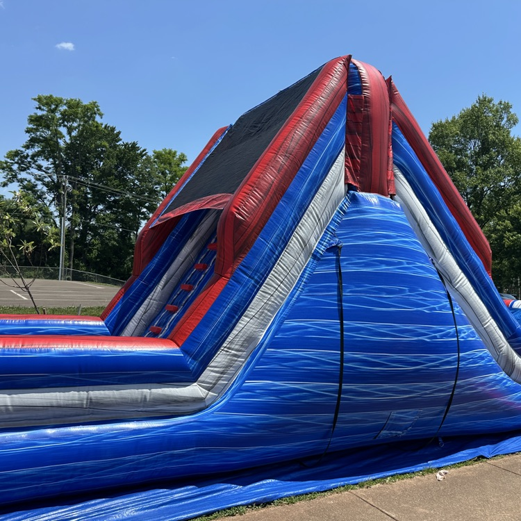outside fifth grade party showing students enjoying fun and games and food