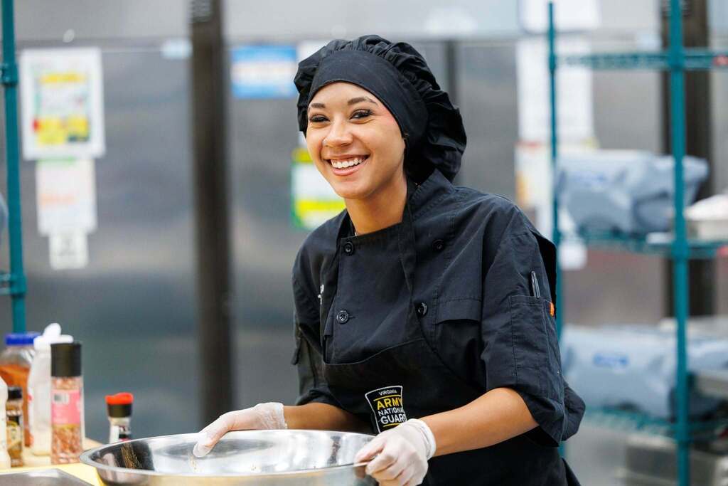 A Culinary Arts student brings confidence and enthusiasm to the kitchen while gaining hands-on experience in food preparation and professional culinary techniques.