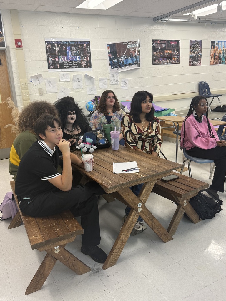 3 female students in a classroom