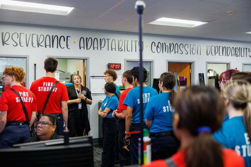 CTEC EMT and Firefighter students tour Culpeper’s Public Safety Emergency Communications Center as a staff member speaks to the group about emergency communications and dispatch operations.