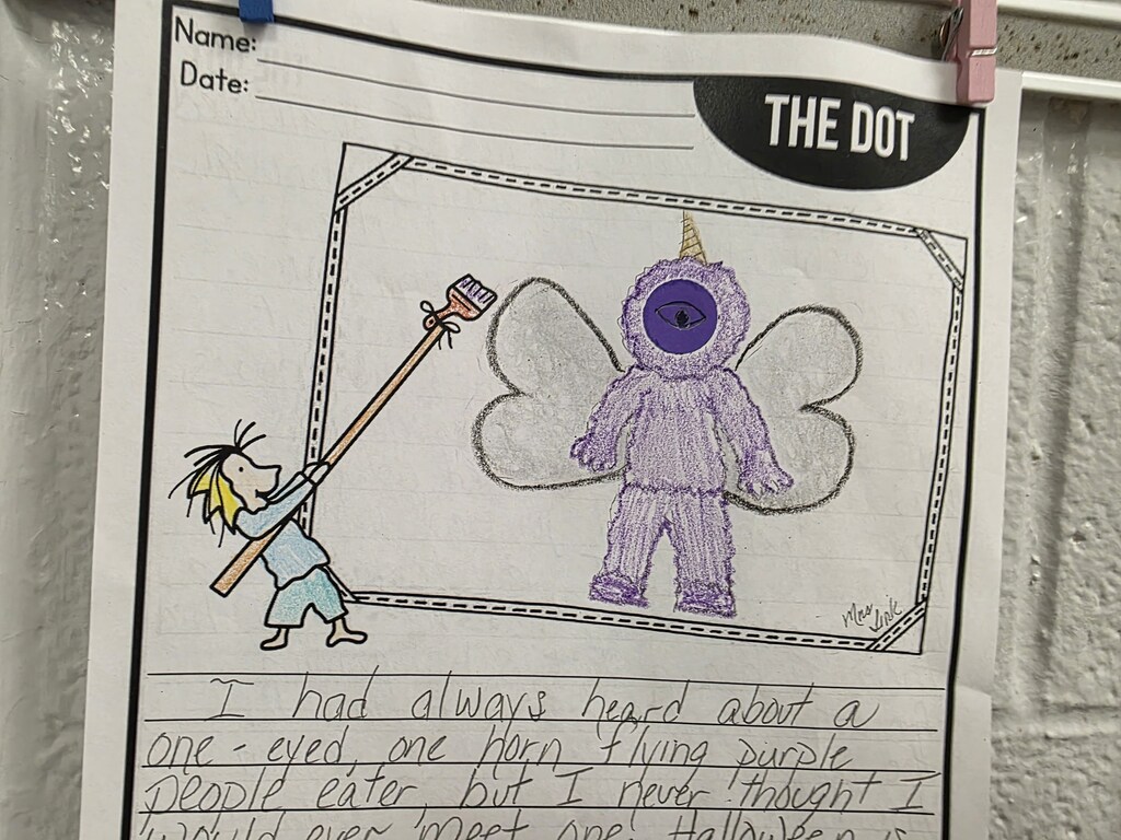 Drawing of a girl holding a stick next to a purple creature. Below is a text describing the drawing.