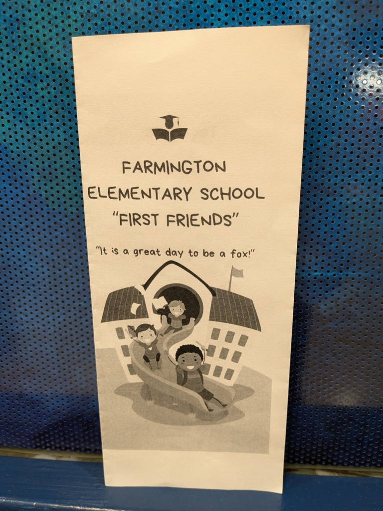 White paper with black text reading "FARMINGTON ELEMENTARY SCHOOL 'FIRST FRIENDS'" and a drawing of children on a slide.
