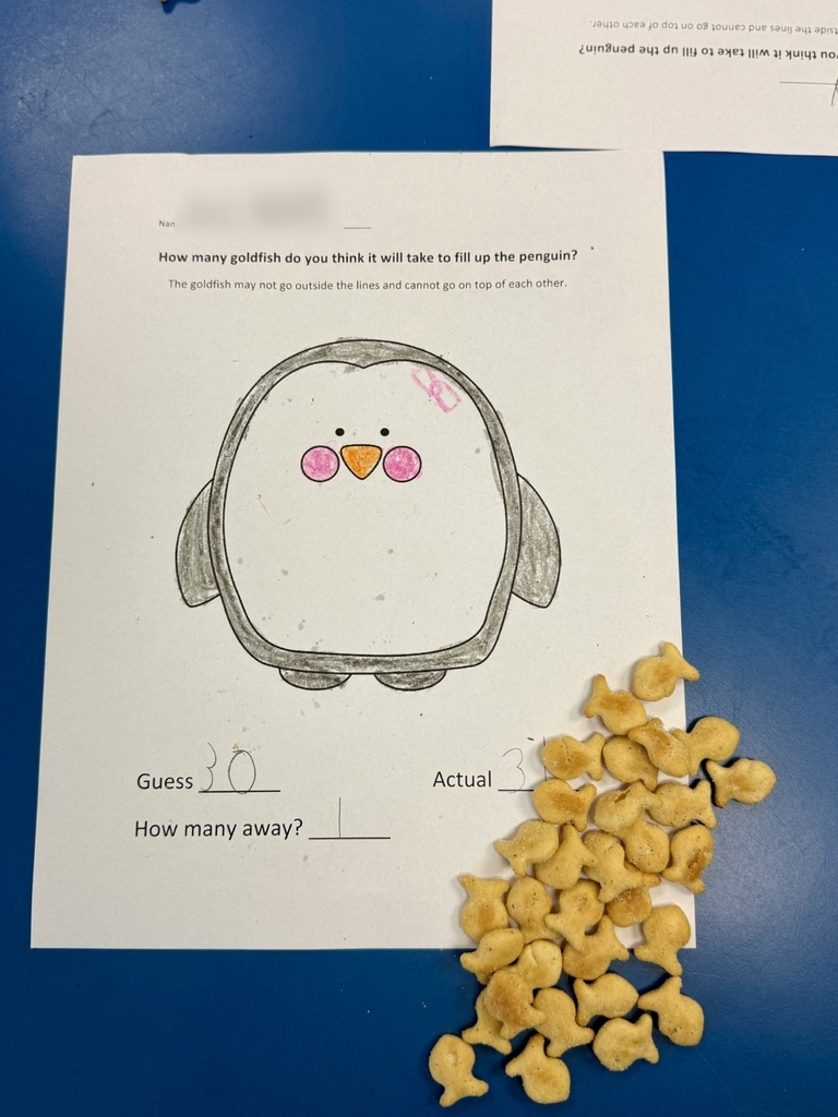 Drawing of a penguin next to a math question about goldfish on a blue background. Pile of goldfish crackers beside the paper.