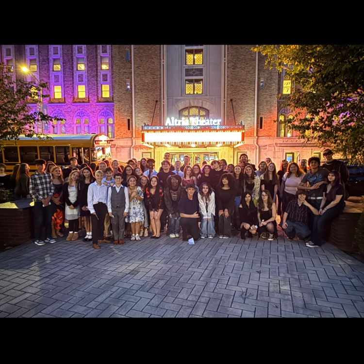 students posed together in front of Altria Theatre 