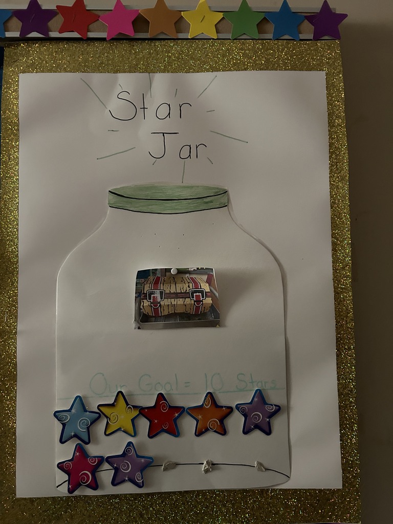 This is a picure of Mrs. Frack's magnetic star jar that is attached to a bulletin board in her room.  There are already 7 stars in the jar. 