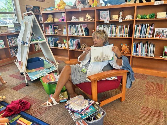 In this picture, Ms Zuna, our librarian shows a book that has been stained by syrup.