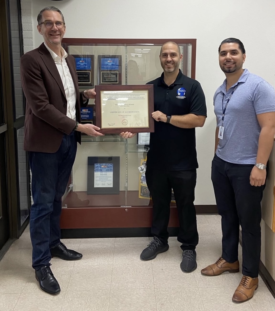 From left to right: Culver City Mayor Freddy Puza, Principal Dr. Paul Karaiakoubian and WASC Team Lead Daniel Gomez celebrate the school’s accreditation during a celebratory visit on Feb. 16.