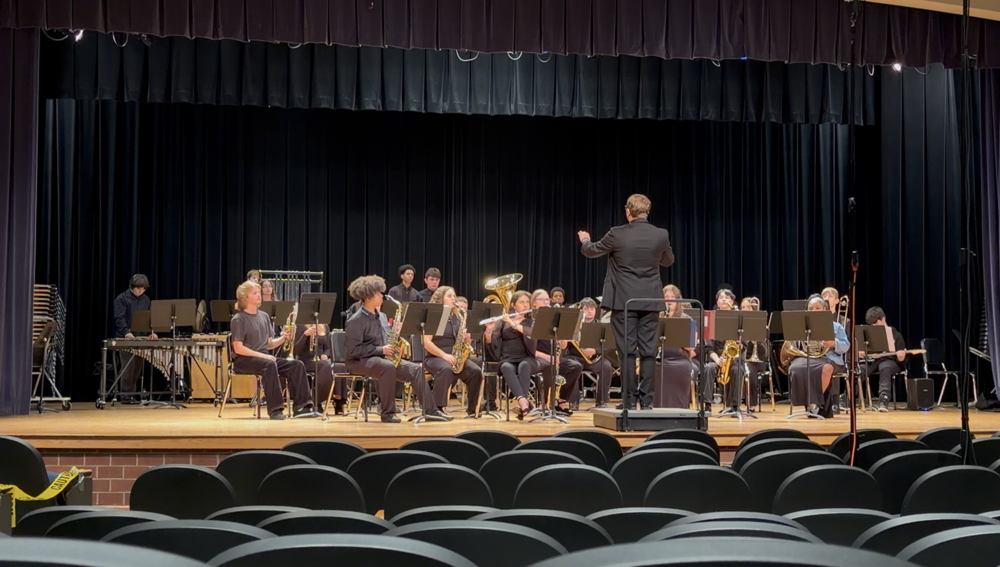 Band director leading the band students
