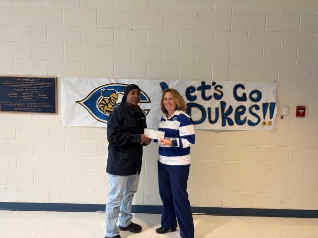 Check presented to Mrs. Shores
