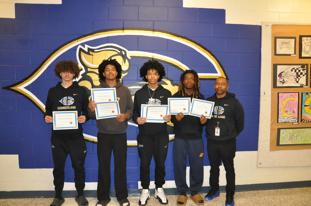 Ryan Fernandez, Azzari Patterson, Allahjah Harris, De’Onta Bartee, and Coach Tyrone Mosby. 