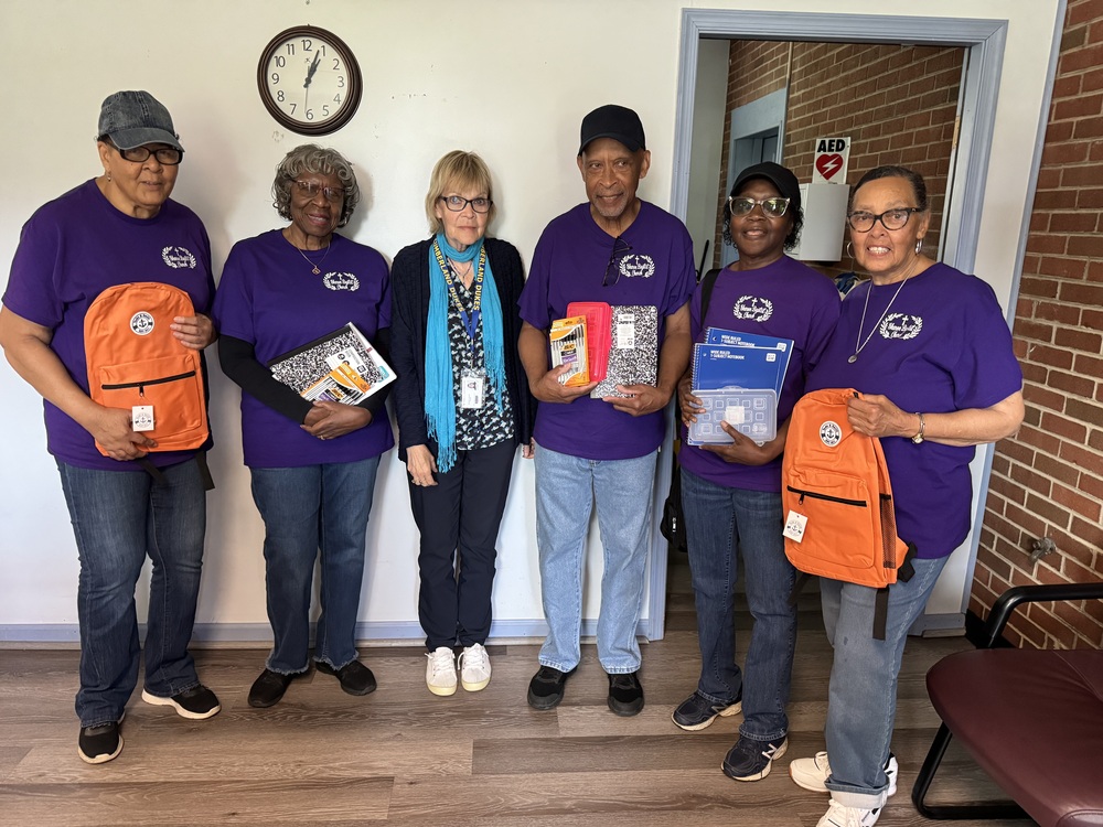 Members of Sharon Baptist Church donates school supplies
