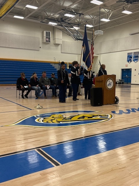 Veteran's Day opening ceremony with flags