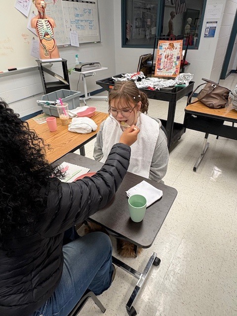Nursing student feeds culinary Arts students 3