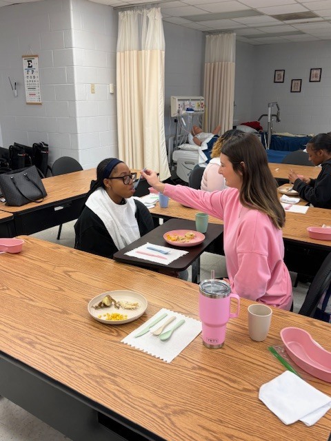 Nursing student feeds culinary Arts students 4