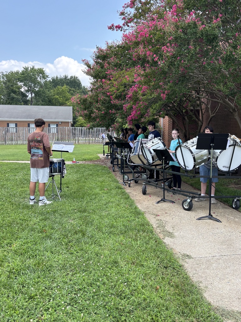 Students practicing drum