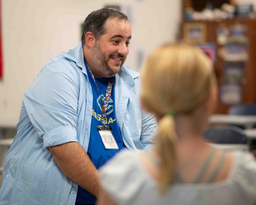 High school parents and students met with teachers.