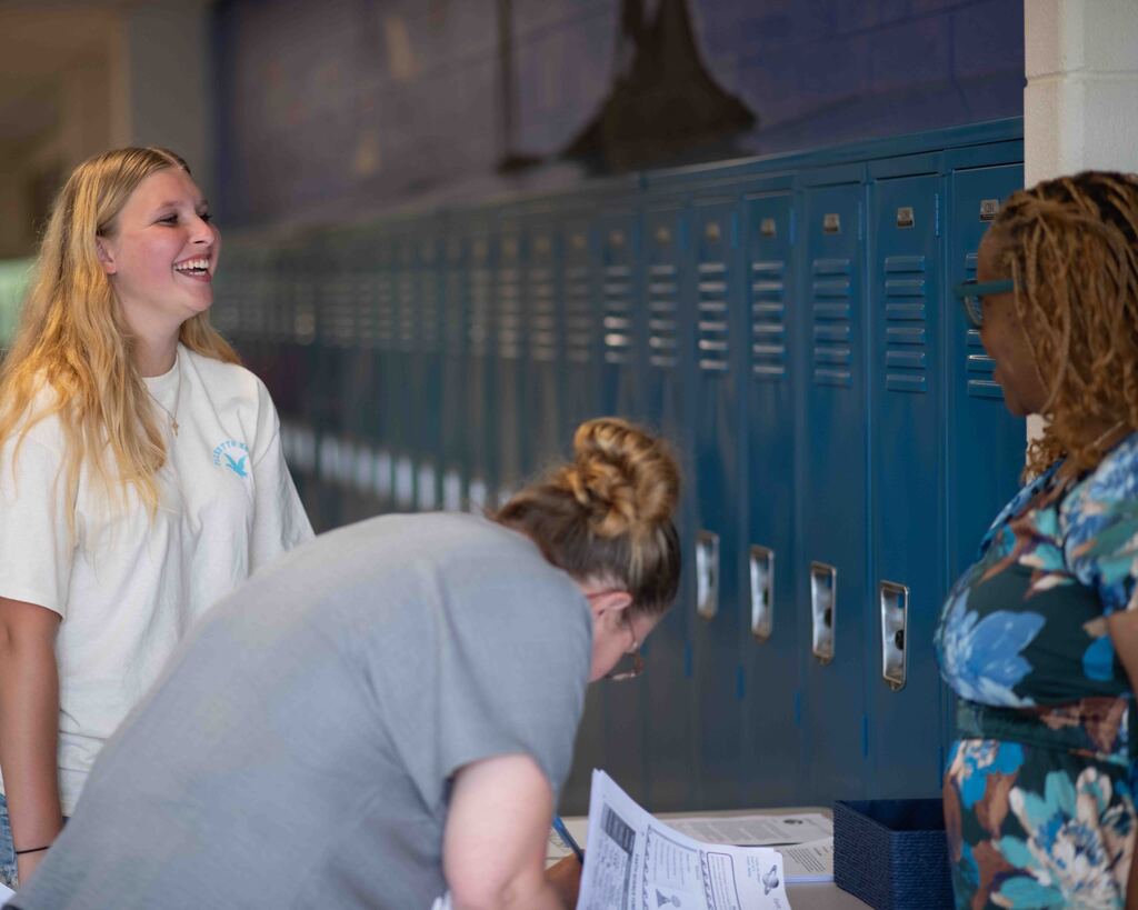 High school parents and students met with teachers.