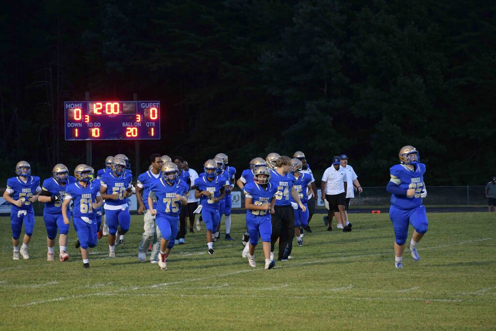 The Dukes enter the field.