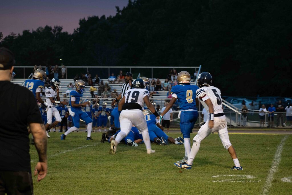 Dukes bring down an opponent.