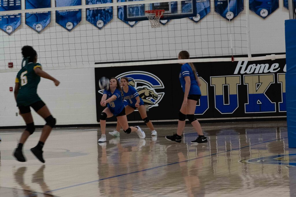 A player returns a serve.