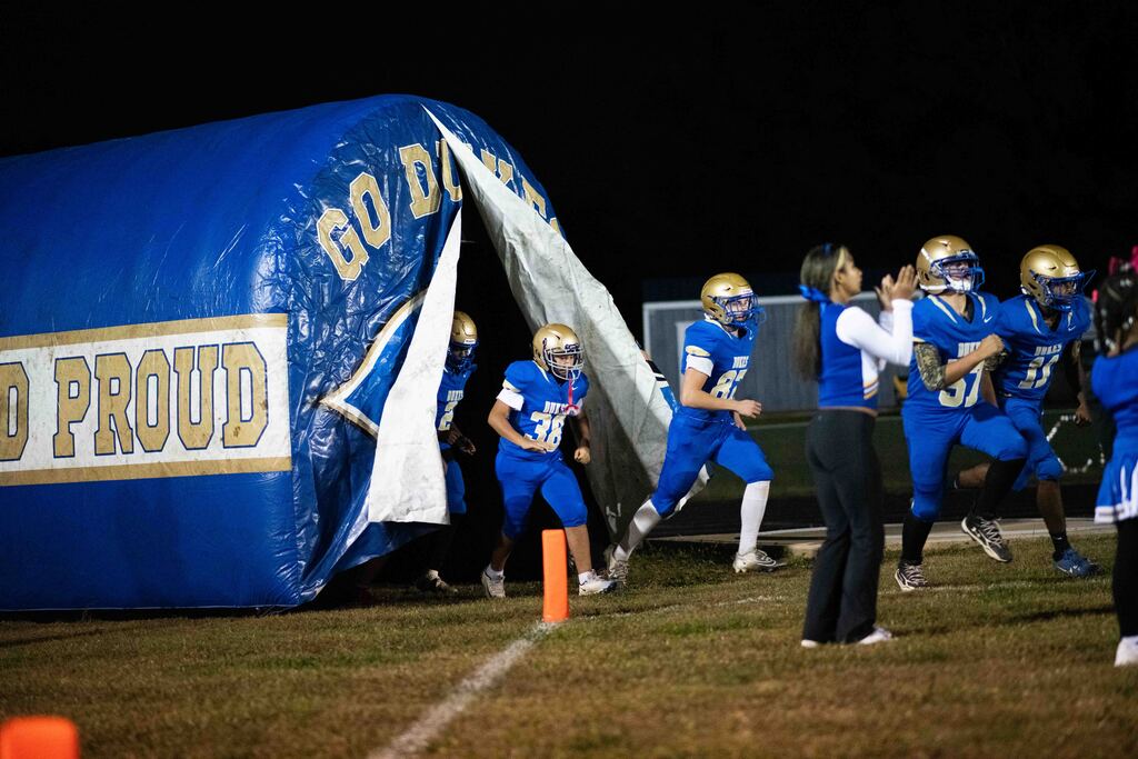 The Dukes take the field.
