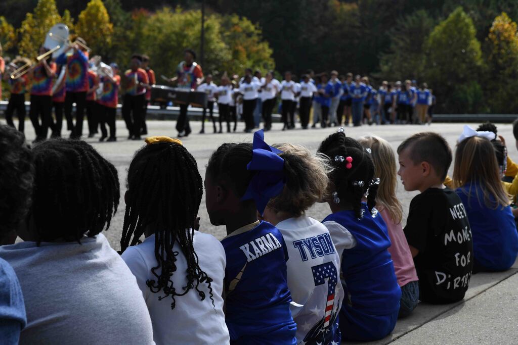 CES students watch the parade pass their school.
