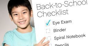 image of boy with a school supply checklist