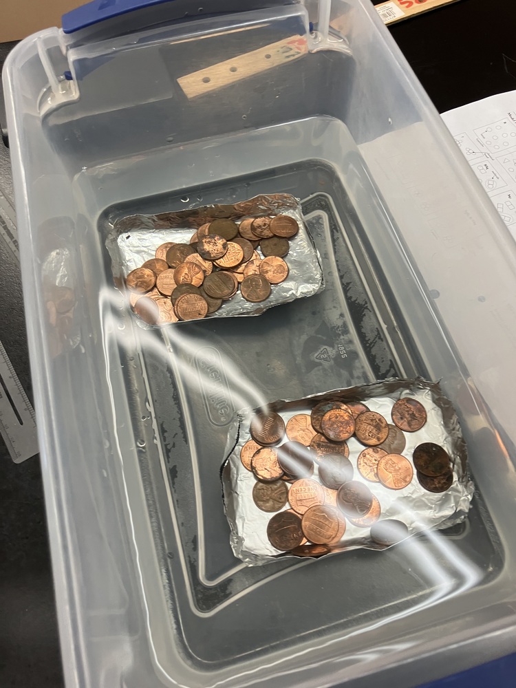 Image of pennies in water