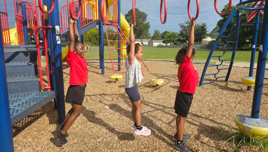 Children playing on a colorful playground