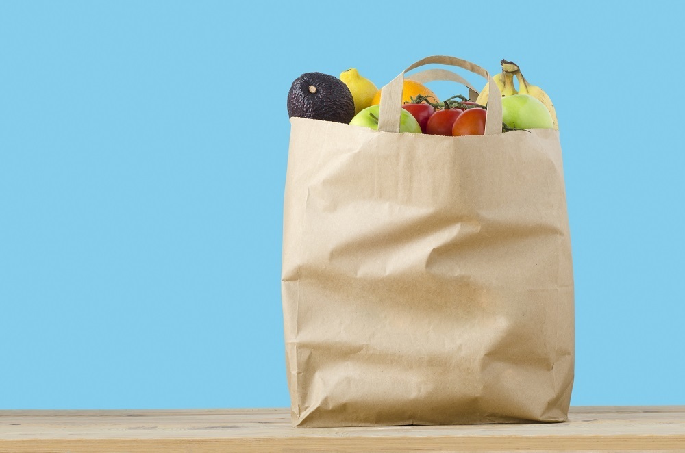 image of grocery bag filled with fruits and vegetables