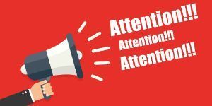 megaphone with words "Attention"