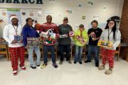 mentoring group holding gifts