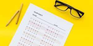 Testing-Exam sheet on yellow background