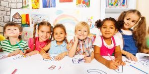 group of children coloring 